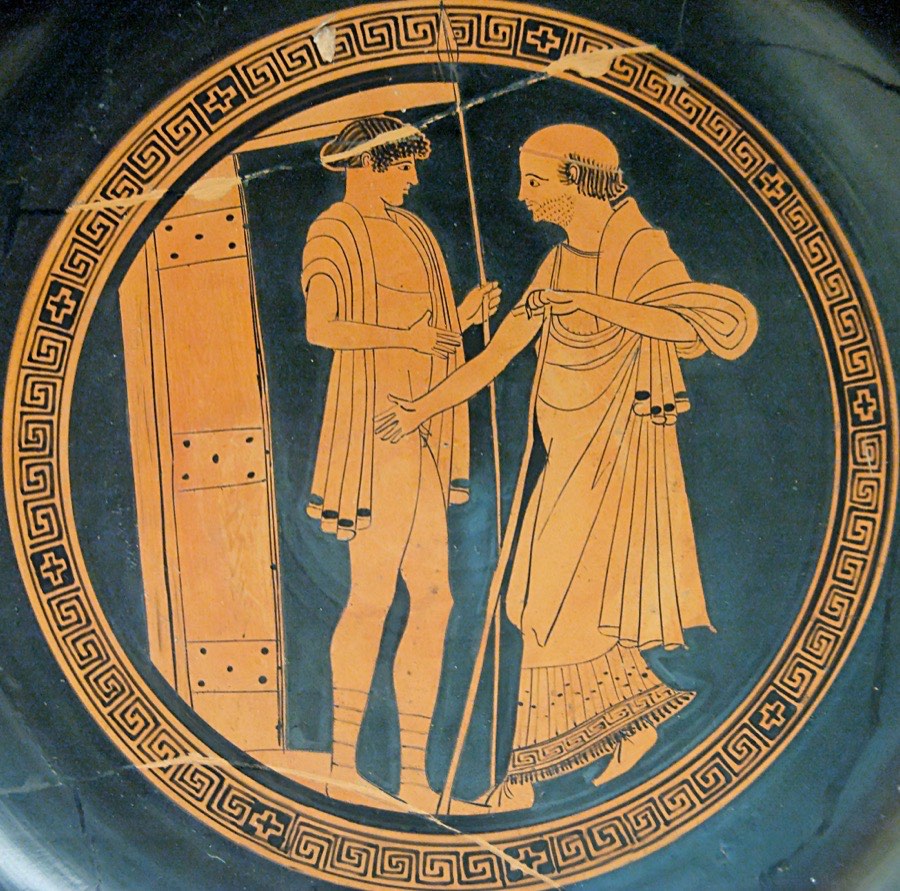 A red-figure painting in the round bowl of a Greek cup: the old king Priam, bearded and cloaked, reaches toward a young man with a spear at the door of Achilles' hut.